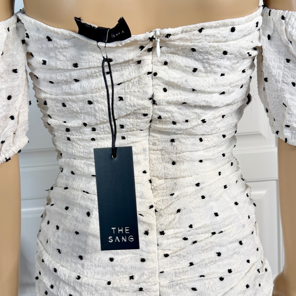 OFF WHITE MINI DRESS WITH BLACK POMPOMS - Picture 16 of 17